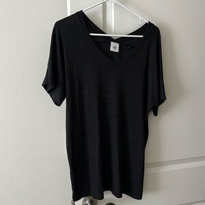 Cabi Dark heather gray top. V back with slight V in the front.